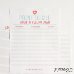A printable sheet titled "PEOPLE TO CALL WHEN I'M FEELING DOWN" features columns for "FRIEND'S NAME," "PHONE NUMBER," and "OTHER INFO," along with a heart and cross icon and branding for "MY EMOTIONAL FIRST AID KIT" and "JW PRINTABLES.COM."