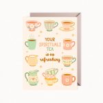 A greeting card features an illustration of various pastel-colored teacups, mugs, and creamers, with the text "YOUR SPIRITUALI TEA is so refreshing."