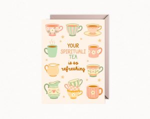 A greeting card features an illustration of various pastel-colored teacups, mugs, and creamers, with the text "YOUR SPIRITUALI TEA is so refreshing."